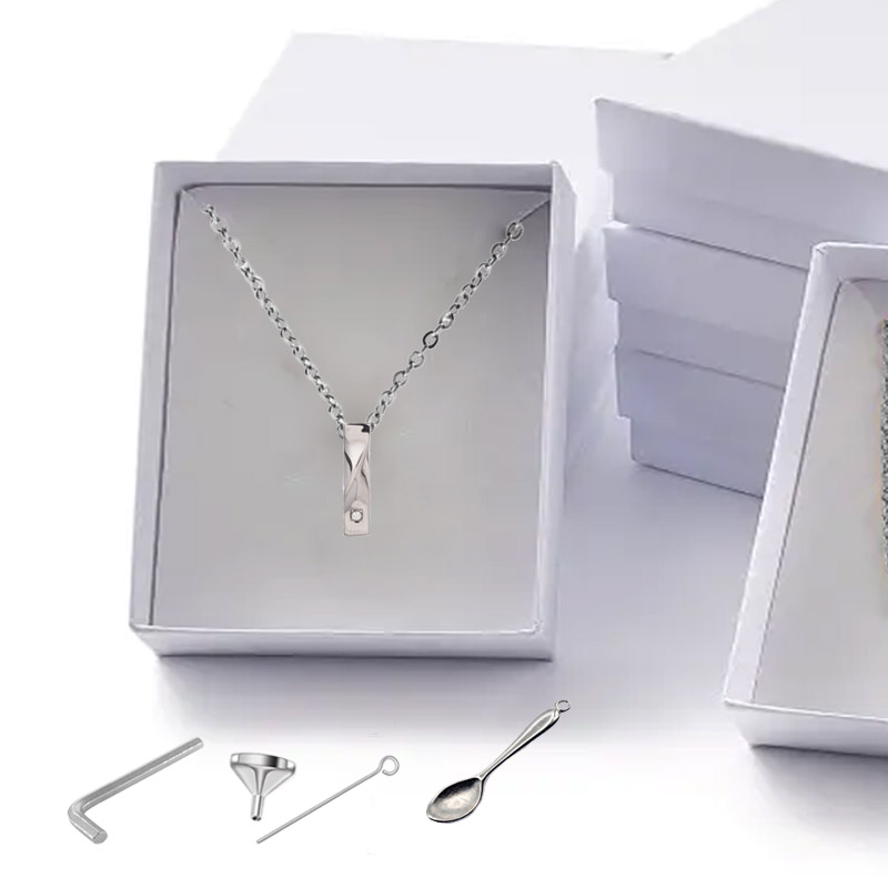 JOYA PORTACENIZAS TORBELLINO INOX