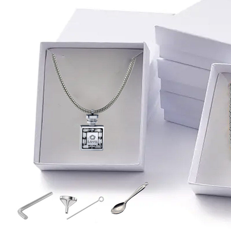 JOYA PORTACENIZAS PERFUME LOVE