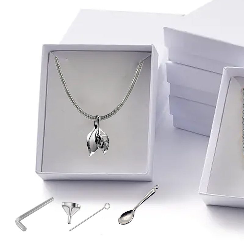 JOYA PORTACENIZAS PAREJA DE HOJASS OTOÑO