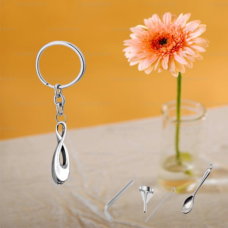 LLAVERO PORTACENIZAS INFINITO